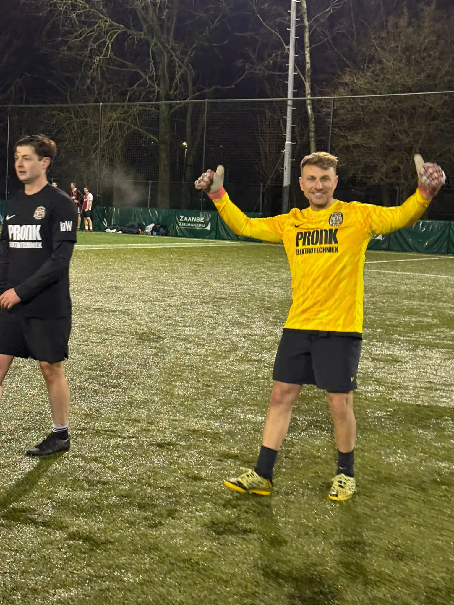 X&3K Team Player celebrating victory on the pitch