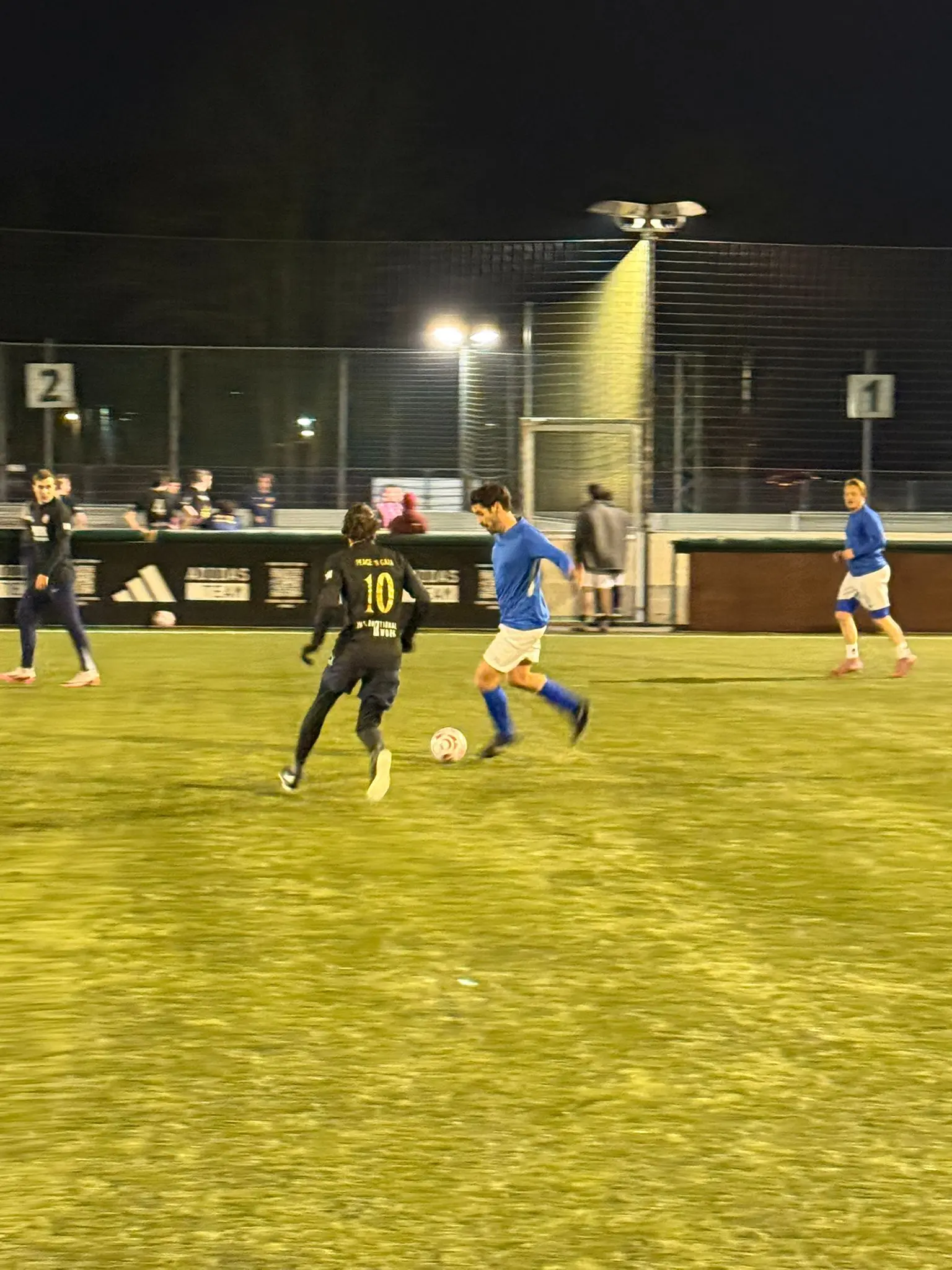 X&3K Team Player showing defensive skills on the pitch
