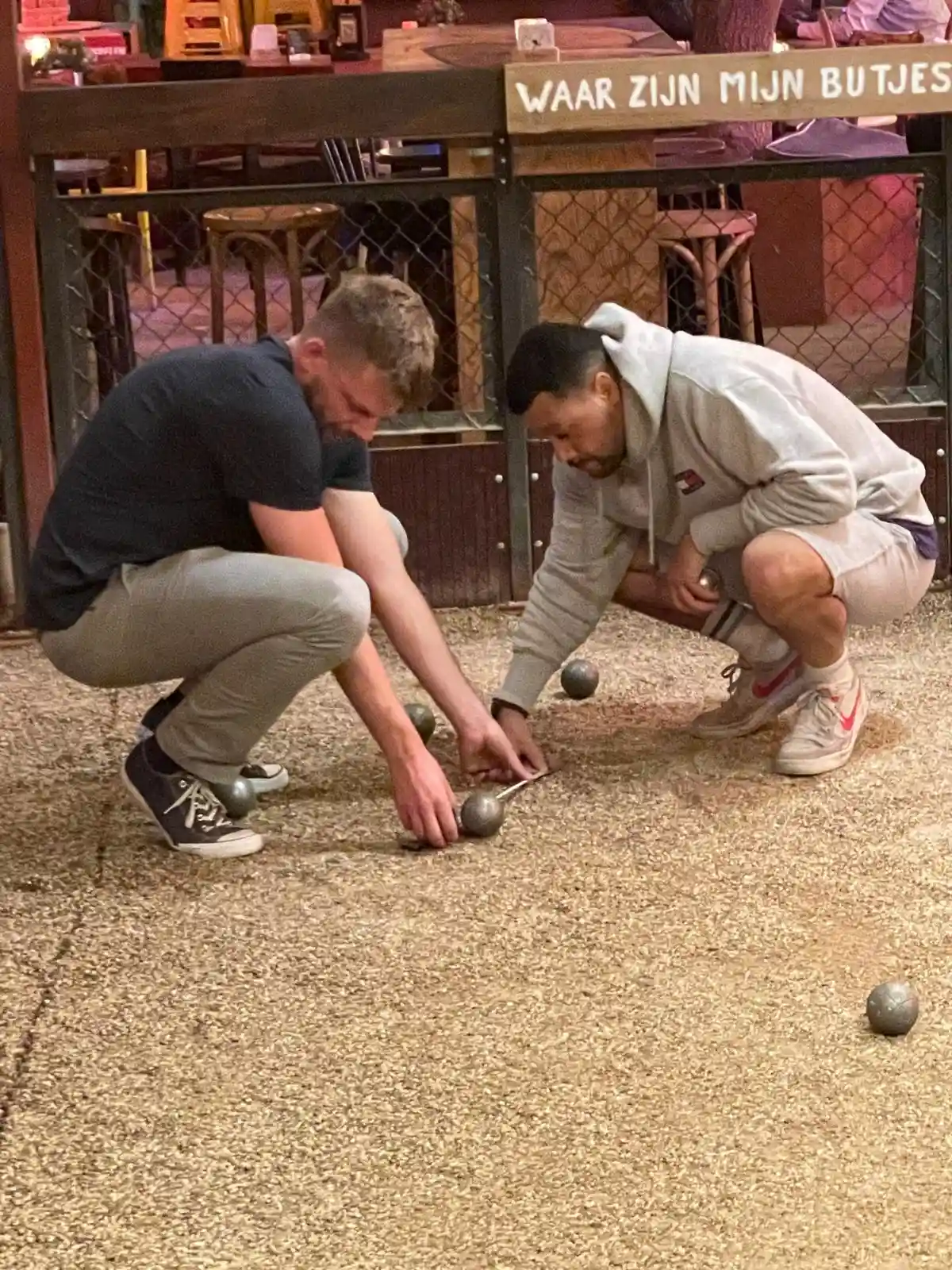 X&3K Team playing Petanque during night out