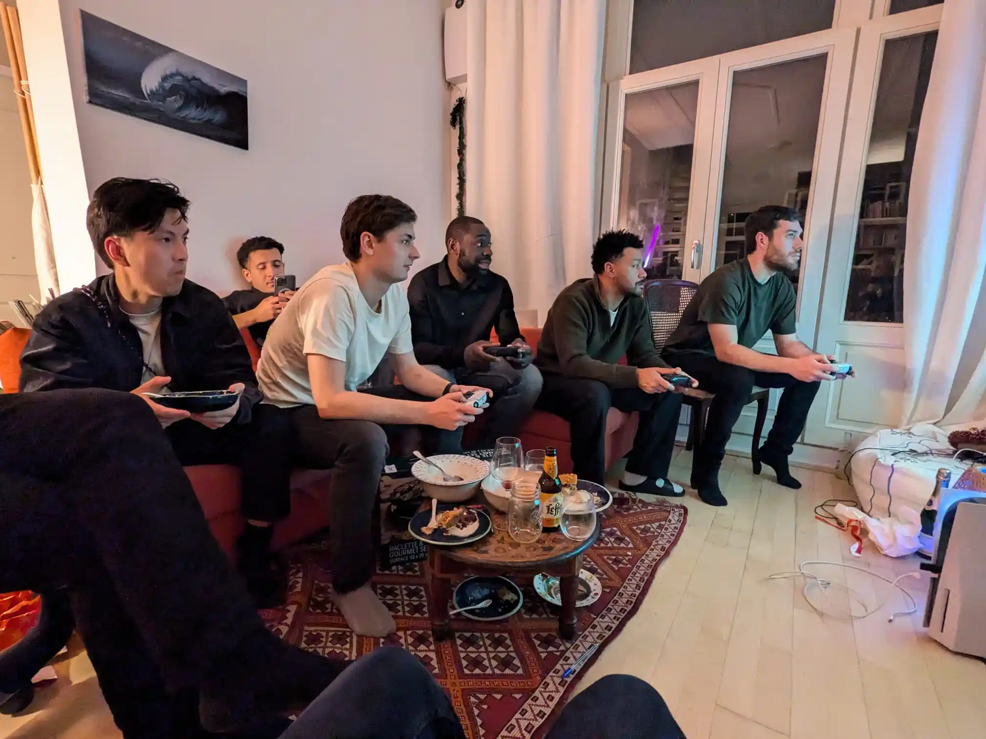 X&3K Team Playing PlayStation at End of the Year Party
